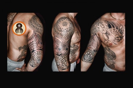 Tatuaje maori en el brazo, con un mandala en el hombro