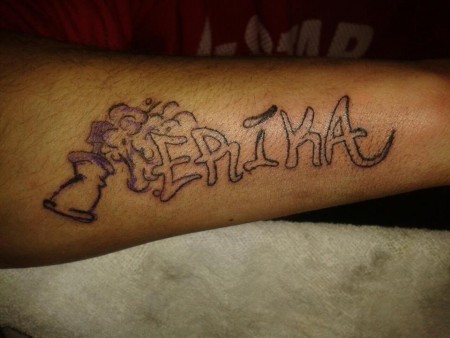 Tatuaje del nombre erika en el antebrazo