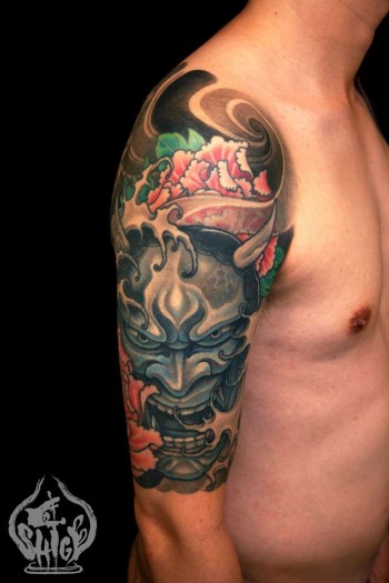Tatuaje de un demonio japonés furioso, en el brazo