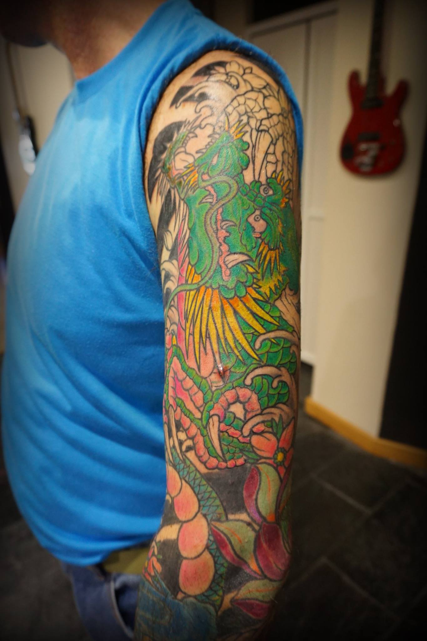 Tatuaje japonés de un dragón en el brazo - Tatuajes de Dragones