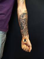 Tatuaje de un tigre dando un zarpazo. Tattoo en el antebrazo
