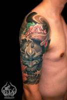 Tatuaje de un demonio japonés furioso, en el brazo