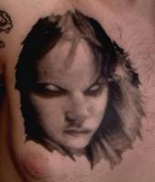Tatuaje de una cara terrorifica