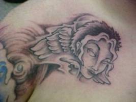 Tatuaje de la cabeza de un angel
