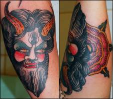 Tatuaje de un monstruo con cuernos