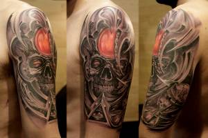 Tatuaje de una calavera en un marco alienígena