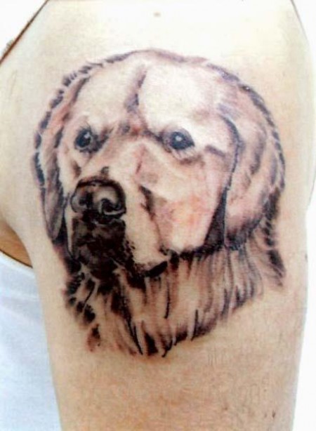 Tatuaje de una cabeza de perro