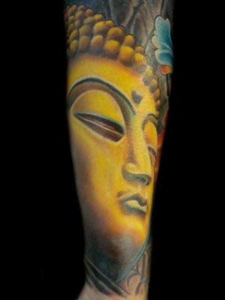 Tatuaje de una cabeza de estatua de buddha