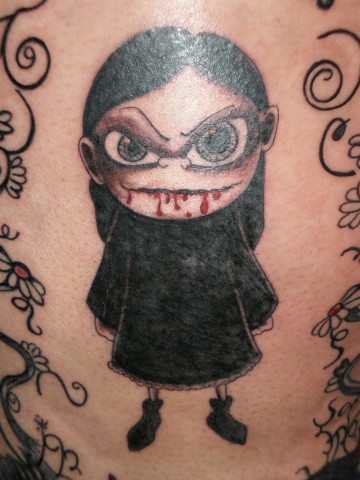 Tatuaje de un muñeco sanguinario