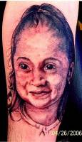 Tatuaje, retrato de una cara