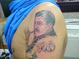 Tatuaje de retrato en el brazo