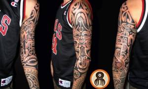 Tatuaje maori. Tatuaje de todo el brazo