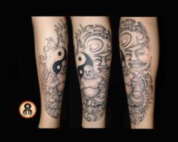 Tatuaje de un buda y del yin yang