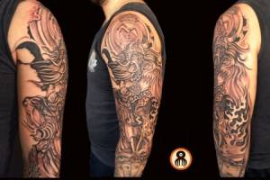 Tatuaje de un vikingo y el escudo del real madrid