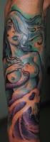 Tatuaje de uns sirena con medio cuerpo pulpo