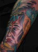 Tatuaje de un samurai atravesado por una daga