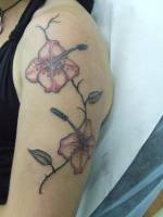 Tatuaje de dos grandes flores