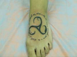 Tatuaje de un simbolo celta en el pie