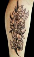 Tatuaje de un Vikingo con una gran hacha