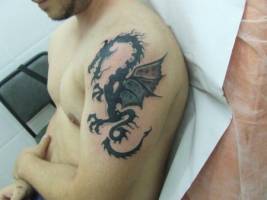 Tatuaje de un dragón alado