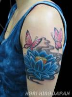 Flores y Mariposas en el brazo