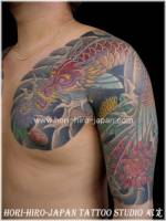 Tatuaje de una carpa transformandose en dragón