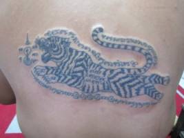 Tatuaje sagrado de un tigre
