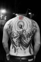 Tatuaje de un ángel en la espalda
