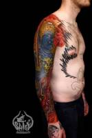 Tatuaje de un ogro japonés en el brazo