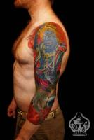 Tatuaje de un ogro japonés en el brazo