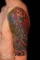 Tatuaje para el brazo de un dragón