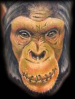 Tatuaje de un mono con la boca cosida