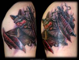 Tatuaje de un murciélago medio momia