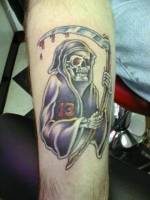 Tatuaje de la muerte con guadaña sangrienta