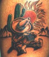 Tatuaje de un mejicano durmiendo en el desierto