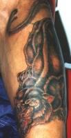 Tatuaje de Pantera en el antebrazo