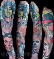 Tatuaje de varias caras en el brazo
