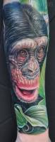 Tattoo de una cara de mono