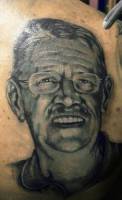 Tatuaje retrato de una cara