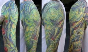 Tatuaje de una funda para brazo estilo alienígena