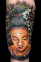 Tatuaje de una cara de geisha japonesa
