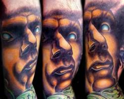 Tatuaje de una cara de monstruo