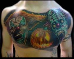 Tatuaje terrorífico de payasos y una calabaza de halloween