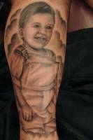 Tatuaje del retrato de un niño