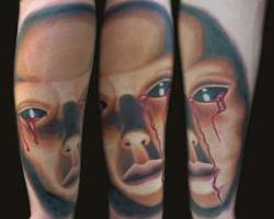 Tatuaje de una cara terrorífica