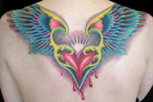 Tatuaje de un corazón con alas