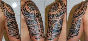 Tatuaje maorí en el brazo con algunas espirales