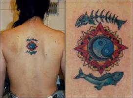 Tatuaje de el yin yang y peces