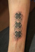 Tatuaje del simbolo de amsterdam  marcado en la piel