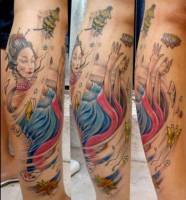 Tattoo de una geisha rodeada de viento